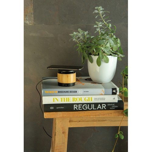 Altavoz y cargador inalámbrico bambú